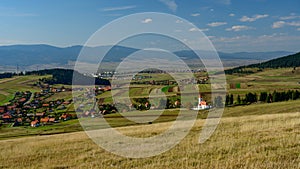 Romanian landscape in the hart of Transylvania with medieval church