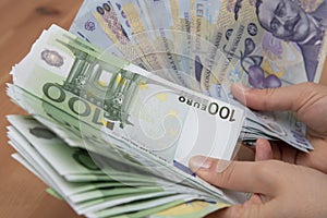 romanian LEI currency and Euro banknotes, close up