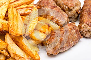Romanian Meatballs Or Mici And Fried Chips