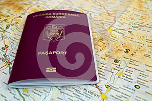 Romanian passport on a map