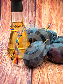 romanian plum brandy known as tuica or tzuica in a glass known as tzoi or toi
