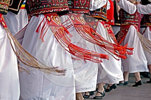 Romanian traditional dance with specific costumes photo