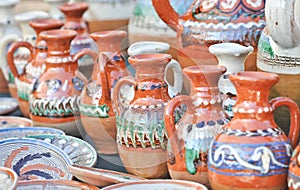 Romanian traditional pottery handcrafted mugs at a souvenir shop. Romanian traditional handcrafted pottery