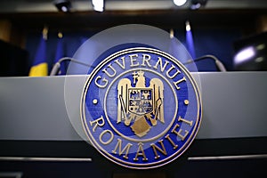 Romaniaâ€™s emblem with the Romanian government text