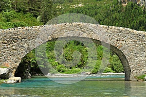 Romanic bridge of Bujaruelo in the region of AragÃÂ³n in Spain. photo