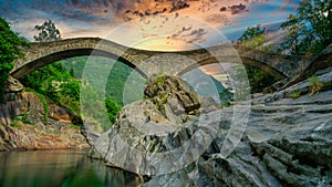 The romanic historic bridge Ponte Dei Salti Bridge in Lavertezzo, Verzasca Valley, ticino, Switzerland. Travel concept.