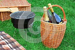 Romanic Weekend Picnic With BBQ Grill And Champagne Concept