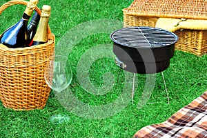 Romanic Weekend Picnic With BBQ Grill And Champagne Concept