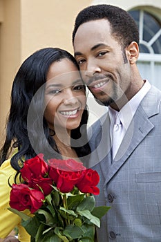 Romantic African American Couple With Roses