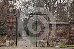 Romantic alley in monumental castle garden
