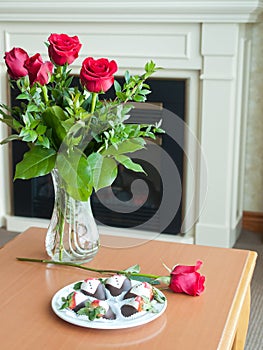 Romantic ambiance flowers and strawberries photo