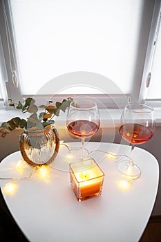 Romantic atmosphere, glasses with red wine