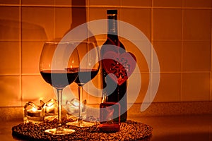 Romantic background with glasses of wine and ring