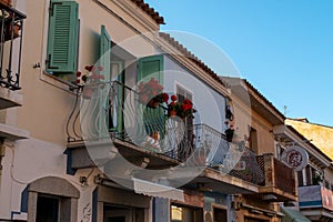 Romantic balconys with blue sky and flowers photo