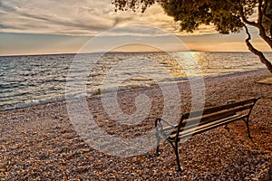 Romantic Beach Bench at Sunset