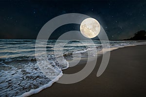 Romantic beach and full moon with star. photo