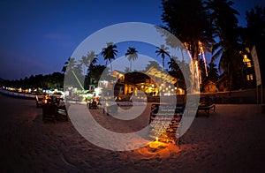 Romantic beach at night in Goa photo