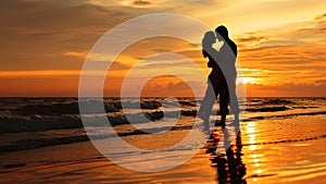 Romantic Beach Sunset Embracing Couple Forms Heart Silhouette