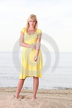 Romantic Beautiful smiling girl yellow dress