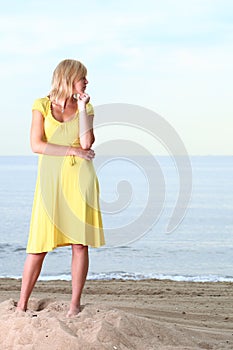 Romantic Beautiful smiling girl yellow dress