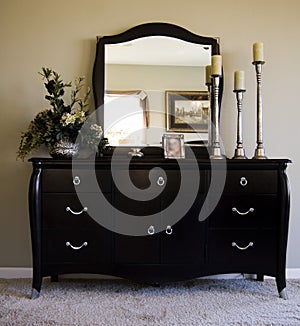 romantic bedroom with mirror on dresser