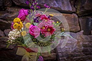 Romantic bouquet and rock wall background 1