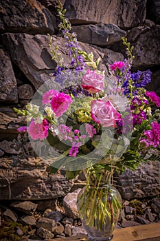 Romantic bouquet and rock wall background 3