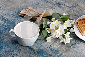 Romantic breakfast. Bouquet of jasmine.