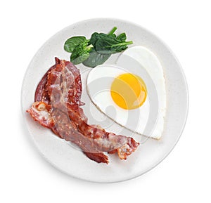 Romantic breakfast with fried bacon and heart shaped egg isolated on white, top view. Valentine`s day celebration