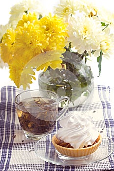 Romantic breakfast. Tea, cake, chrysanthemum