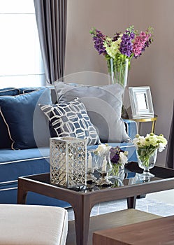 Romantic candle set with beige and blue modern classic sofa in living room