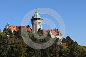 Romantic castle - fortress with tower in the forest. Smolenice castle, Congress Center of SAS - built in 15th century