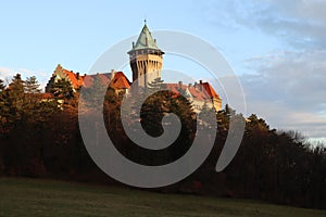 Romantic castle - fortress with tower in the forest. Smolenice castle, Congress Center of SAS - built in 15th century