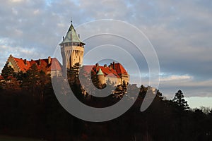 Romantic castle - fortress with tower in the forest. Smolenice castle, Congress Center of SAS - built in 15th century.