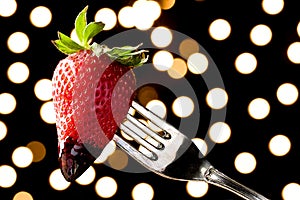 Romantic Chocolate Dipped Strawberry on a Fork photo