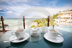 Romantic coffee for two on the beach