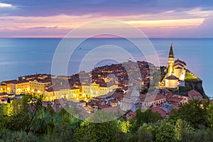 Romantic colorful sunset over picturesque old town Piran, Slovenia.