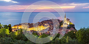 Romantic colorful sunset over picturesque old town Piran, Slovenia.