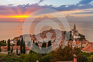 Romantic colorful sunset over picturesque old town Piran, Slovenia. photo