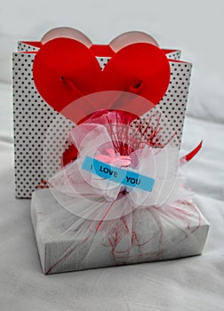 Romantic concept. A gift for his beloved wife, girl. Surprise.