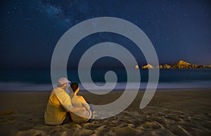 Romantic Couple On Beach At Night in Cabo San Lucas Mexico