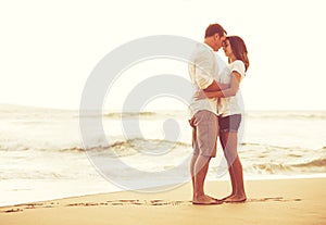 Romantic Couple on the Beach at Sunset.