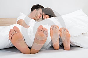 Romantic couple on bed