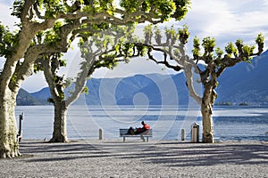 Romantic couple on a bench, Ascona, Ticino, Switzerland