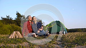 Romantic couple camping in nature on weekend