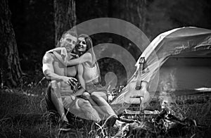 Romantic couple on camping. Outdoor adventure with friends on nature. Sexy coupl travel holidays on nature.
