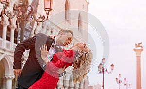 Romantic couple dancing on the street in Venice