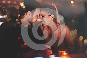 Romantic couple dating in pub