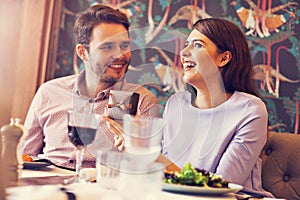 Romantic couple dating in restaurant