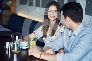 Romantic couple dating in restaurant